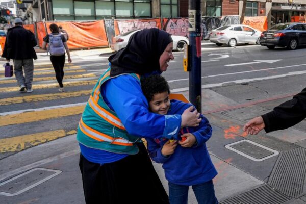 With a Vest and a Voice, Helpers Escort Kids Through San Francisco’s Broken Tenderloin Streets